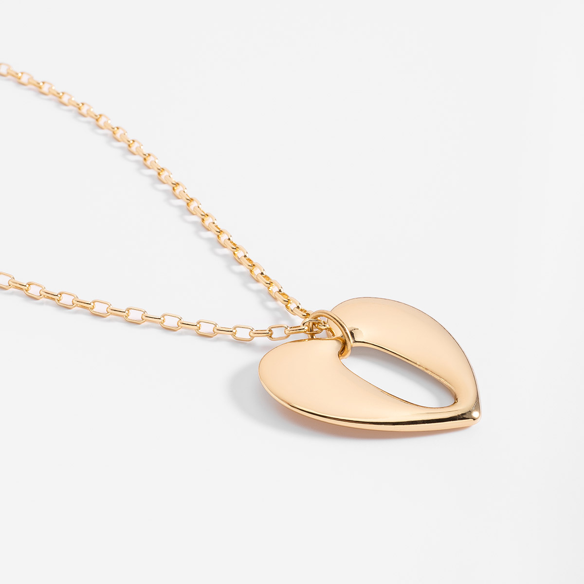 Collar en baño de oro con dije de corazón hueco 42 cm + 10 cm