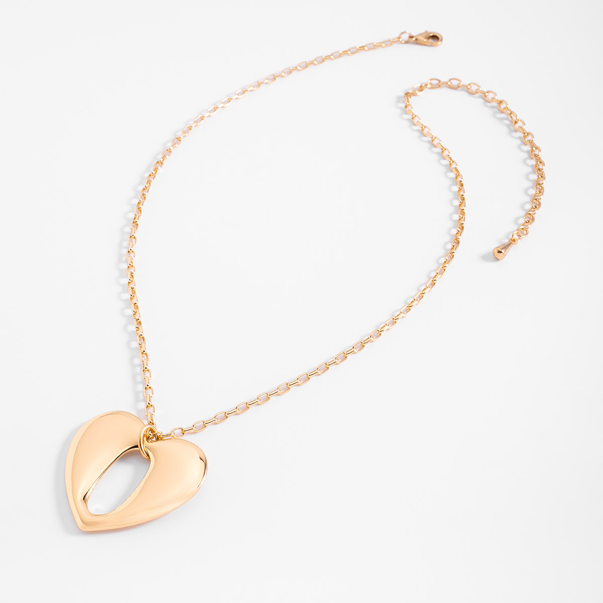 Collar en baño de oro con dije de corazón hueco 42 cm + 10 cm