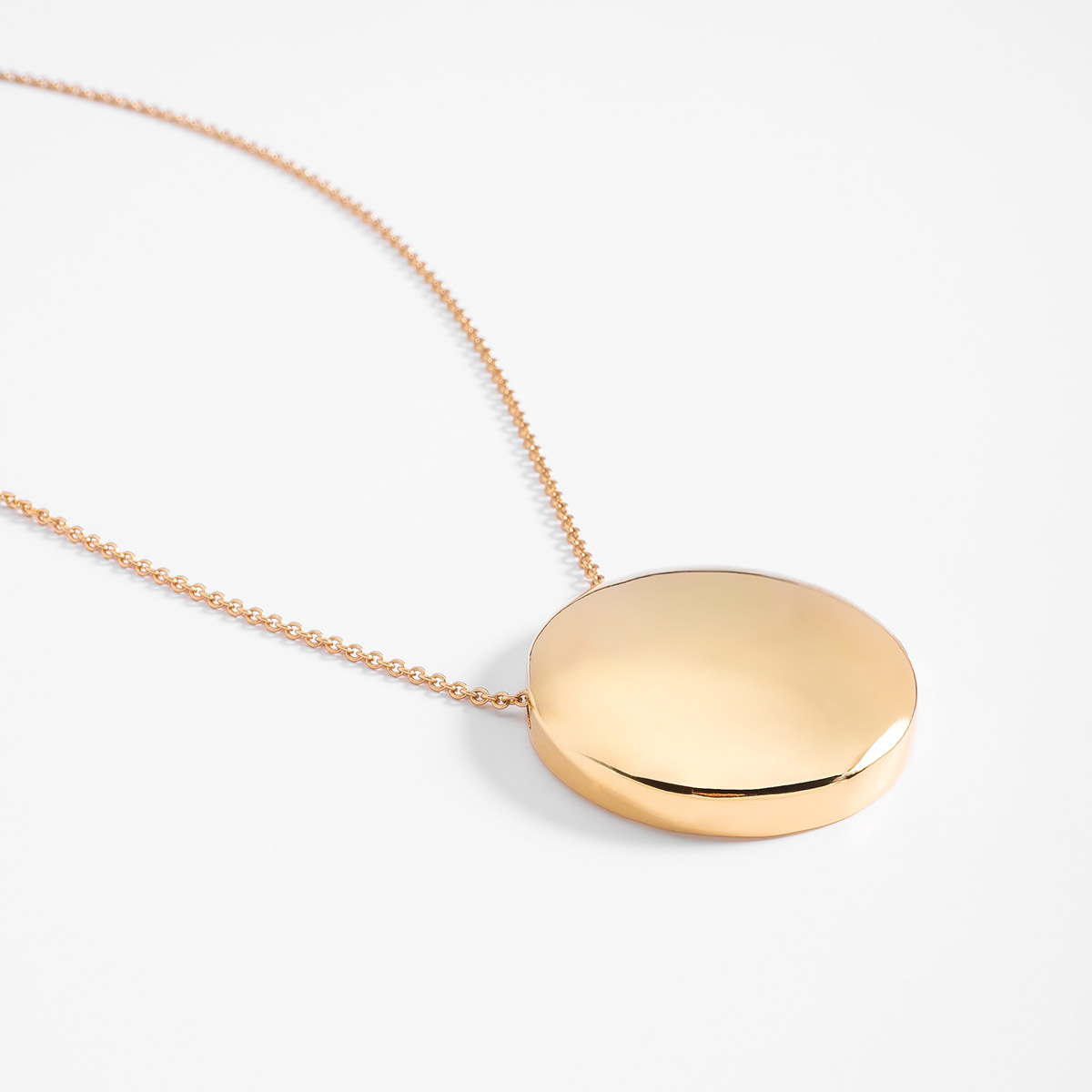 Collar en baño de oro medalla lisa diseño circular largo 42 cm