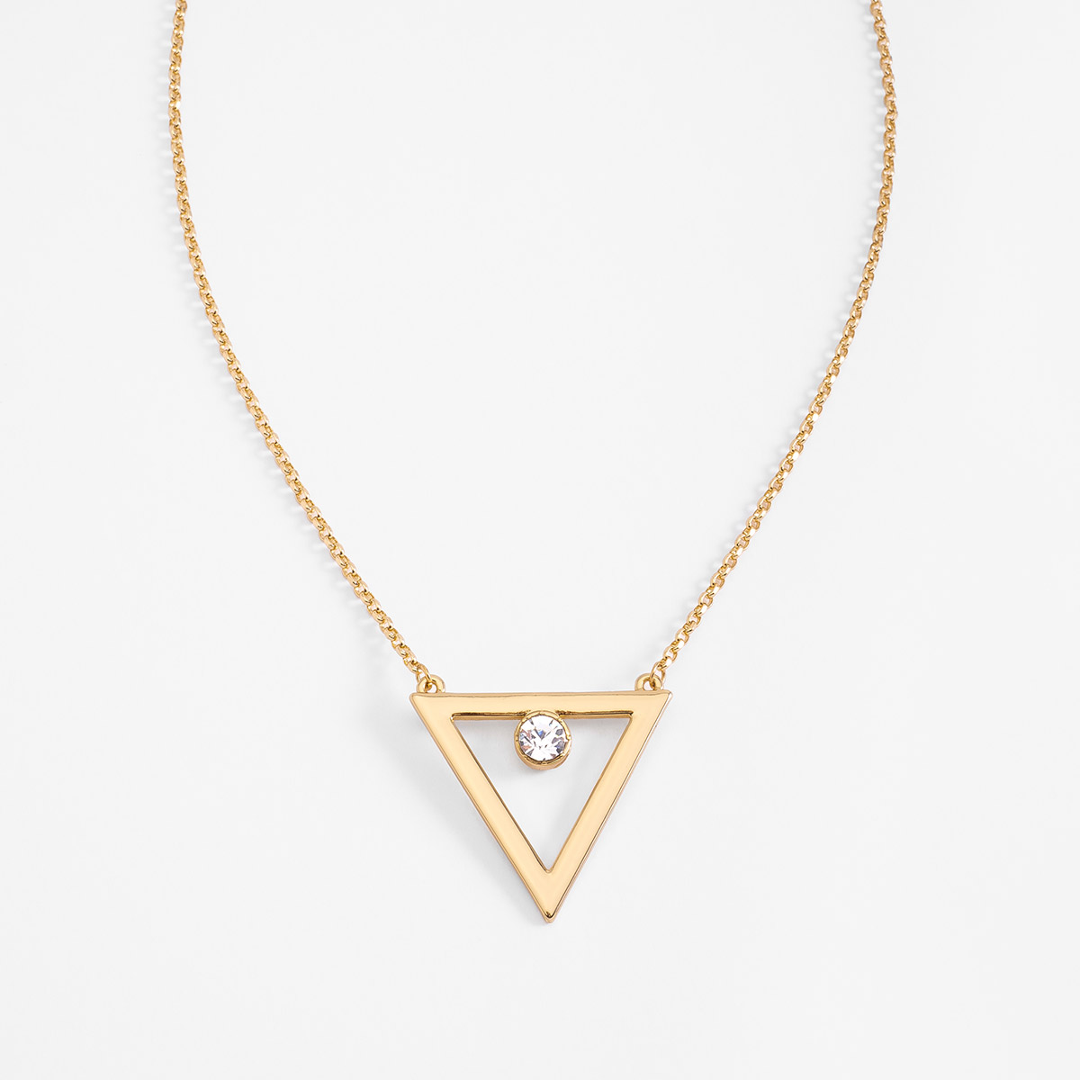 Collar en baño de oro dije triángulo y piedra brillante
